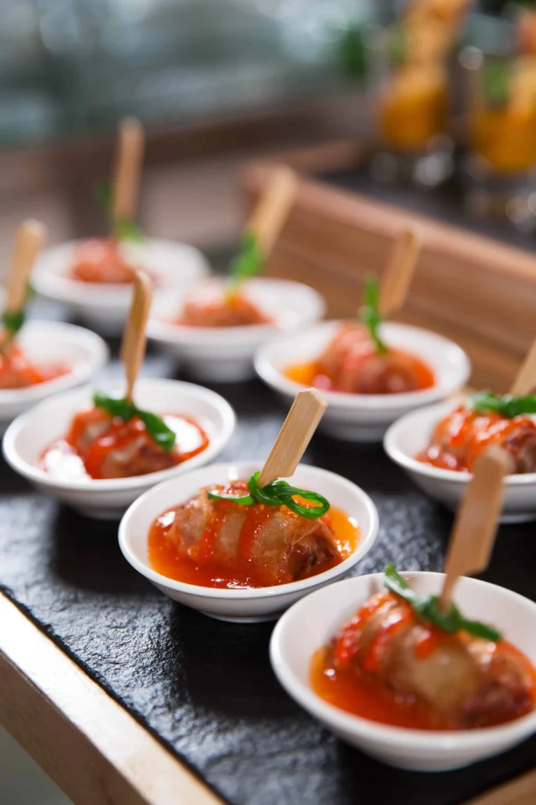 delicious-meat-rolls-with-sauce-small-plates